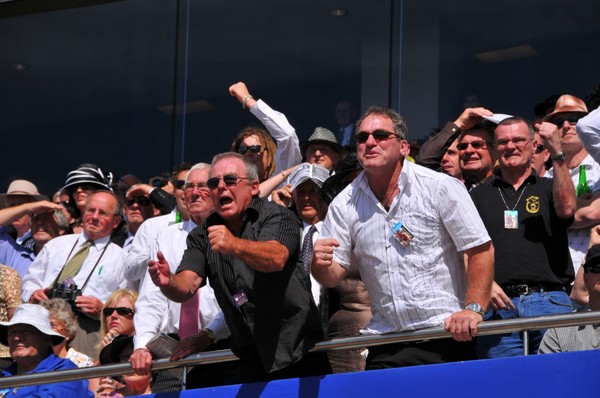 Enthusiastic Punters enjoying a beautiful day at the races.